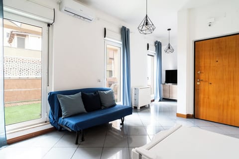 Apartment, 1 Bedroom | Living area | 30-inch TV with satellite channels