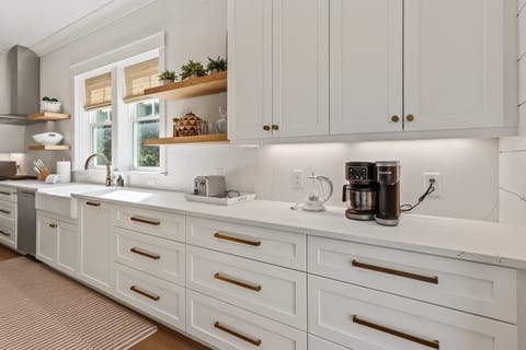 Elegant kitchen with plenty of counter space for those gourmet meal preps.