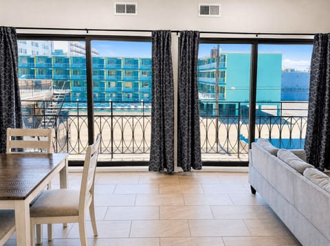 Penthouse | Living area | 37-inch flat-screen TV with cable channels, TV