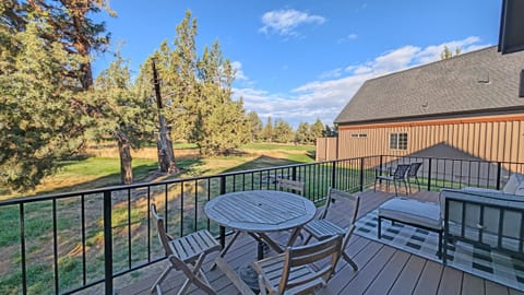 The Deck with BBQ and table and outdoor seating