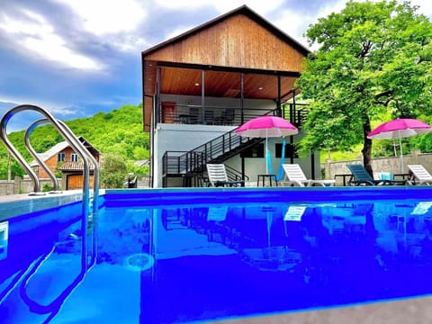 Seasonal outdoor pool, pool umbrellas, sun loungers