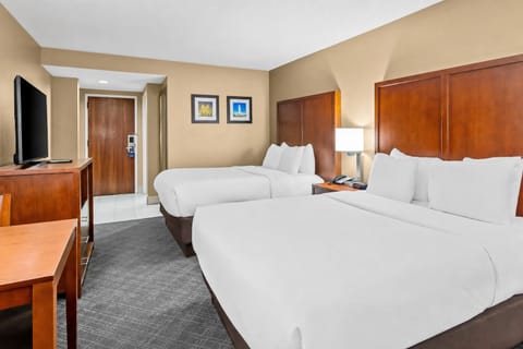 Relax together with two comfy beds and easy room flow.