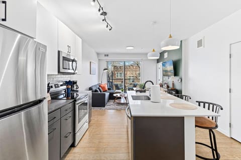 Gourmet Kitchen: Sleek appliances and vibrant decor await your culinary adventures!