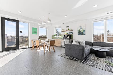 Open-Concept Lounge: Gather in style with natural light, modern decor, and stunning views!