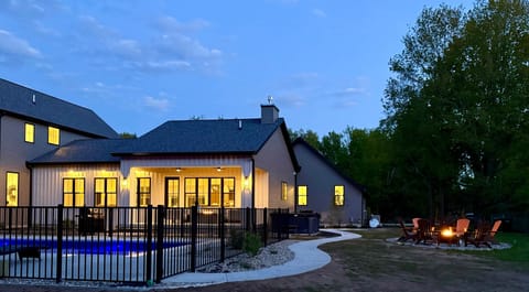 Back yard with pool, 2 gas fire pits, and large hot tub