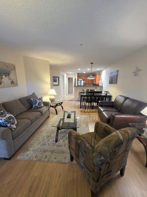 Unit A. The view from executive living room thru kitchen w/ queen pullout sofa.