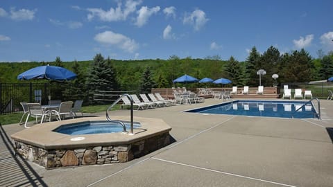 Serene pool area offering the ultimate spot to relax, unwind, and take in the beauty of the Laurel Highlands.