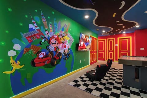 This vibrant game room is where memories are made. Compete, cheer, and laugh with friends and family while enjoying exciting games, bold décor, and a fun atmosphere designed for shared joy and nonstop entertainment.