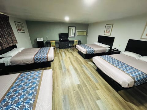 Deluxe Quadruple Room, 1 Bedroom | Free WiFi, bed sheets