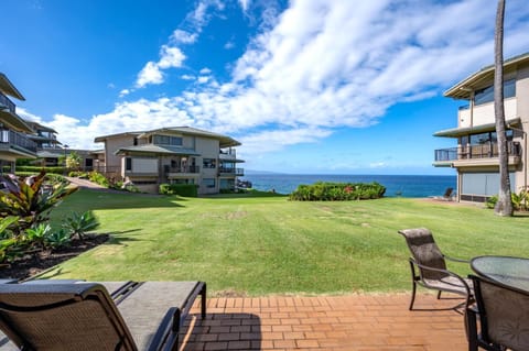Step onto your private lanai and savor panoramic views of tropical gardens and the sparkling Pacific beyond KBV-28G2