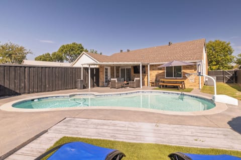 Fully-fenced backyard w/ pool, basketball hoop,  sun loungers & a floaters rack