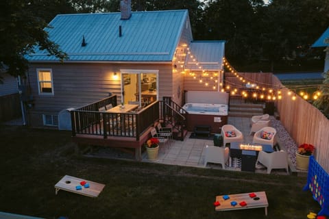 Inviting backyard with fire table and new hot tub