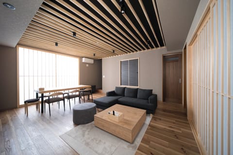 [SAKURA] Comfort Room Rental with Hot Spring, Non smoking | Living area | Flat-screen TV