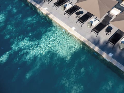 Seasonal outdoor pool, pool umbrellas, sun loungers