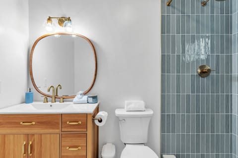 Full Bathroom 1 with a shower