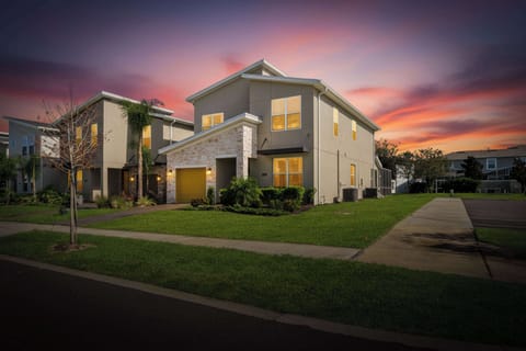 Great Single Family Property located on Golf Course at Champions Gate Resort with 5 bedrooms and Jacuzzi, Pool with Screen and Open Floor Plan , fully equipped kitchen with resort amenities included !