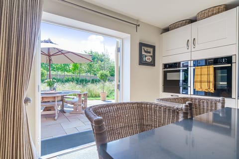 kitchen doors opening out to terrace