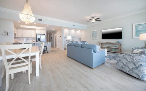 Gather in this welcoming living space and enjoy stunning beach views through the windows