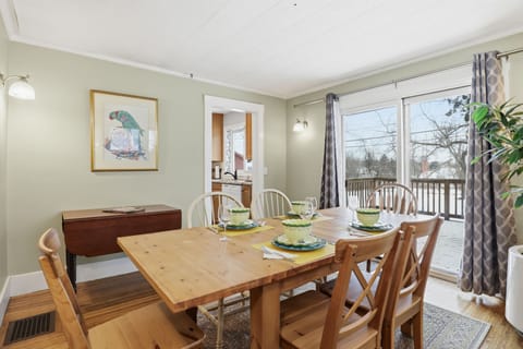 Dining room table easily accommodates 6 people.  Restful views of huge backyard