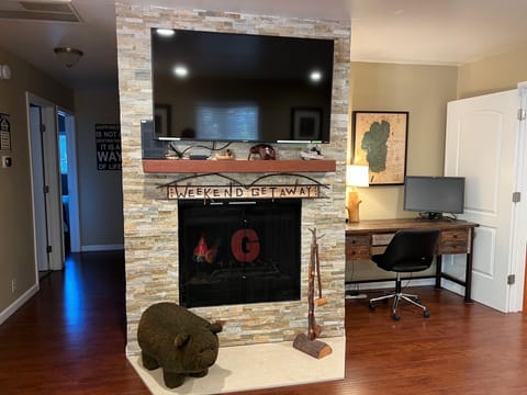 Living Room with Workspace.  It does NOT have a functioning fireplace.