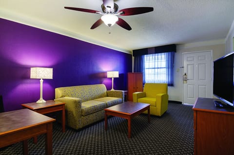 Suite, Non Smoking (Microwave & Refrigerator) | Living room | 37-inch flat-screen TV with cable channels, TV