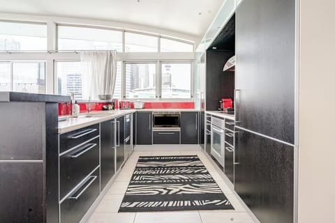 kitchen offers a contemporary design with modern appliances