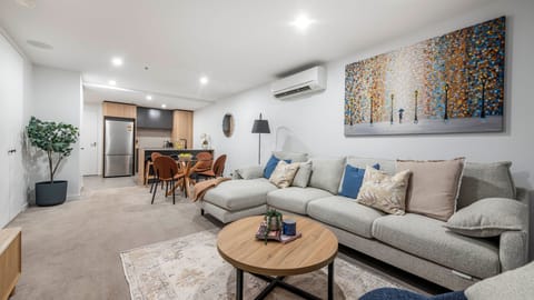 Bright open-plan living area with contemporary design.