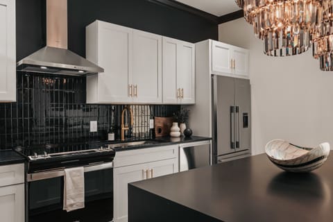 The Highball - The modern kitchen is fully equipped with stainless steel appliances and thoughtfully stocked with everything you need to cook.