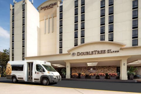 DoubleTree entrance with shuttle parked in front