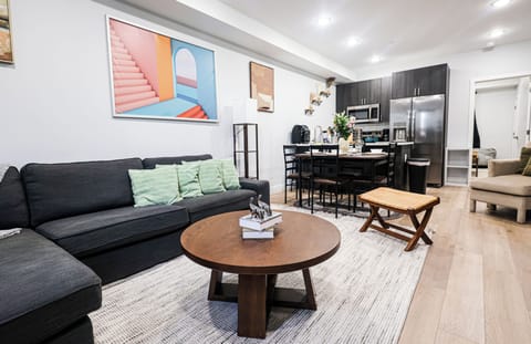 Your alfresco living area, complete with comfortable seating and charming surroundings.