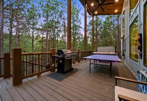 The deck has everything you need to stay entertained—grill up a feast, challenge friends to ping pong, or just kick back and unwind.