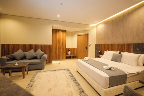 Deluxe Double Room, City View | Minibar, in-room safe, desk, soundproofing