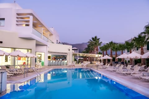 3 outdoor pools, open 9 AM to 7 PM, pool umbrellas, sun loungers
