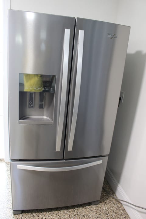 Refrigerator. It stooped to make ice. Water is ready for drink.