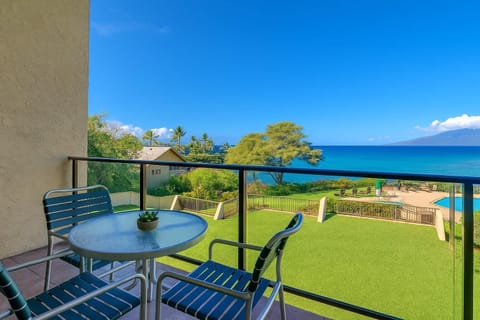 Start your day on the lanai with coffee and ocean views—where every breeze whispers tropical calm     NAP-C42