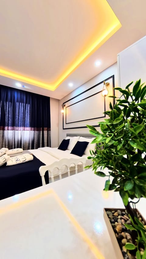 Family Condo, Balcony, City View | Premium bedding, minibar, in-room safe, soundproofing