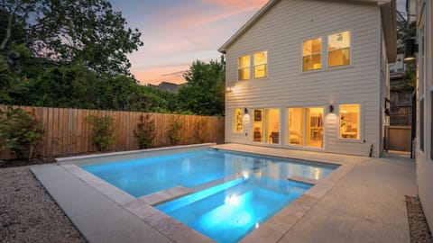 Breathtaking evening setting showcasing the home’s private pool.