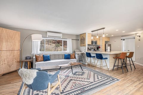 Gather with friends or family in this light-filled space surrounded by Colorado scenery.