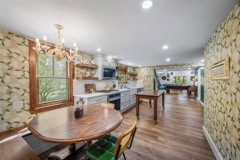 A bright, welcoming kitchen and dining space designed for delicious meals and memorable moments.