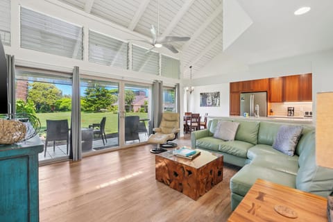Open concept family room , kitchen, and beautiful view out the lanai!