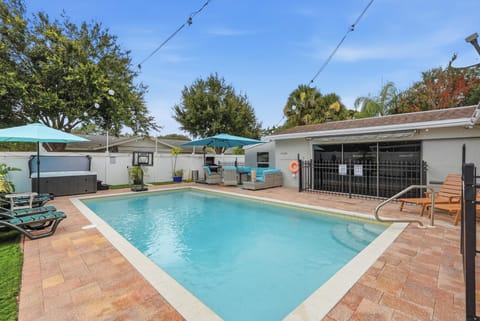 Your private backyard oasis awaits. Take a refreshing dip in our hot tub, lounge in the sun, or enjoy a little friendly fun with the poolside basketball hoop, all in a peaceful, fully fenced space.