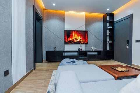 Executive Suite | Living area | TV