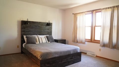 Sink into a spacious, sunlit bedroom for deep relaxation.