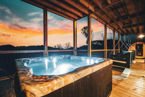 Unwind with a stunning Smoky Mountain view from the hot tub!