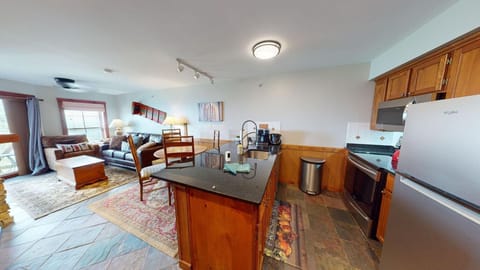 Spacious open-concept kitchen and living area for gatherings