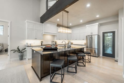 Huge island for cooking, hanging out, or grabbing breakfast before heading out.