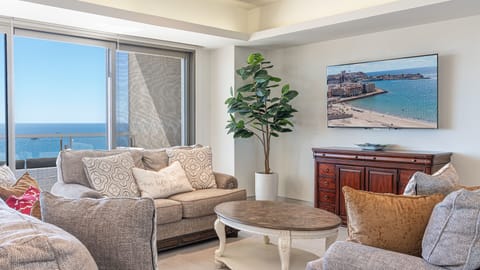 The living room exudes cozy comfort.