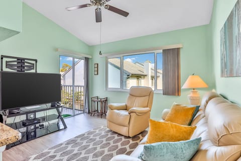 Bright & airy living room that leads to private patio