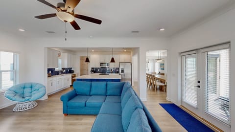 The main living areas of the home are seamlessly integrated, creating an open, airy space to gather and enjoy making new memories together.