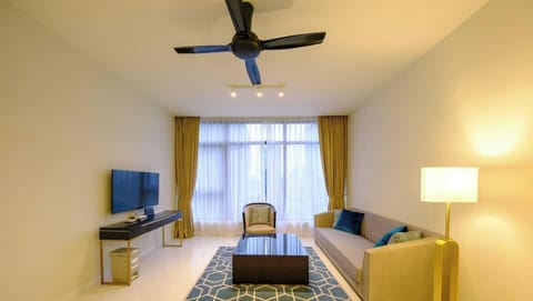 Enjoy yourself in engaging conversations with friends or family, read a book or watch a movie with our 50" Samsung 4K TV, both at the comfort of our designer couch, shown with the sun blocking curtain completely unfolded. 